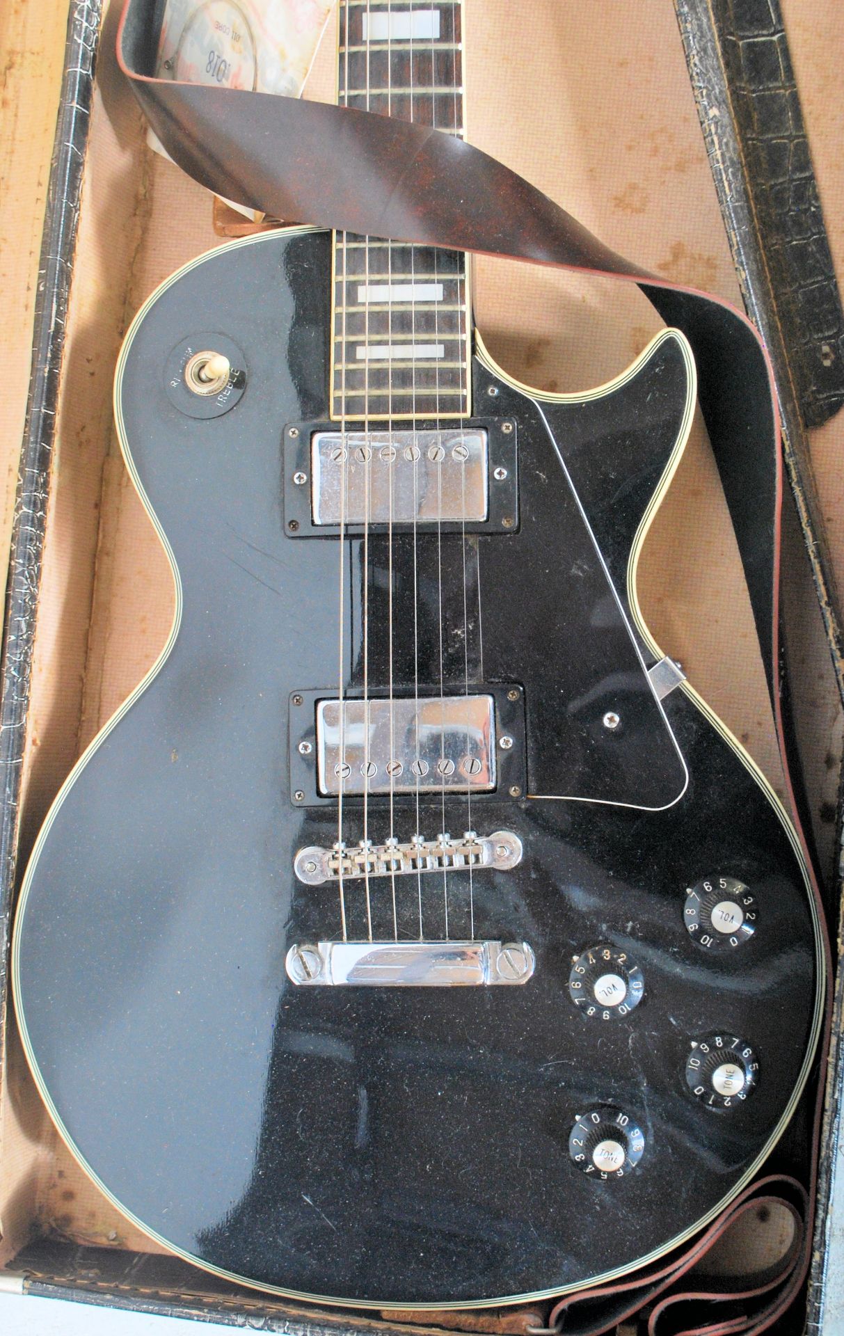 A vintage 20th Century Columbus Les Paul style electric guitar having a black body with four - Bild 3 aus 7