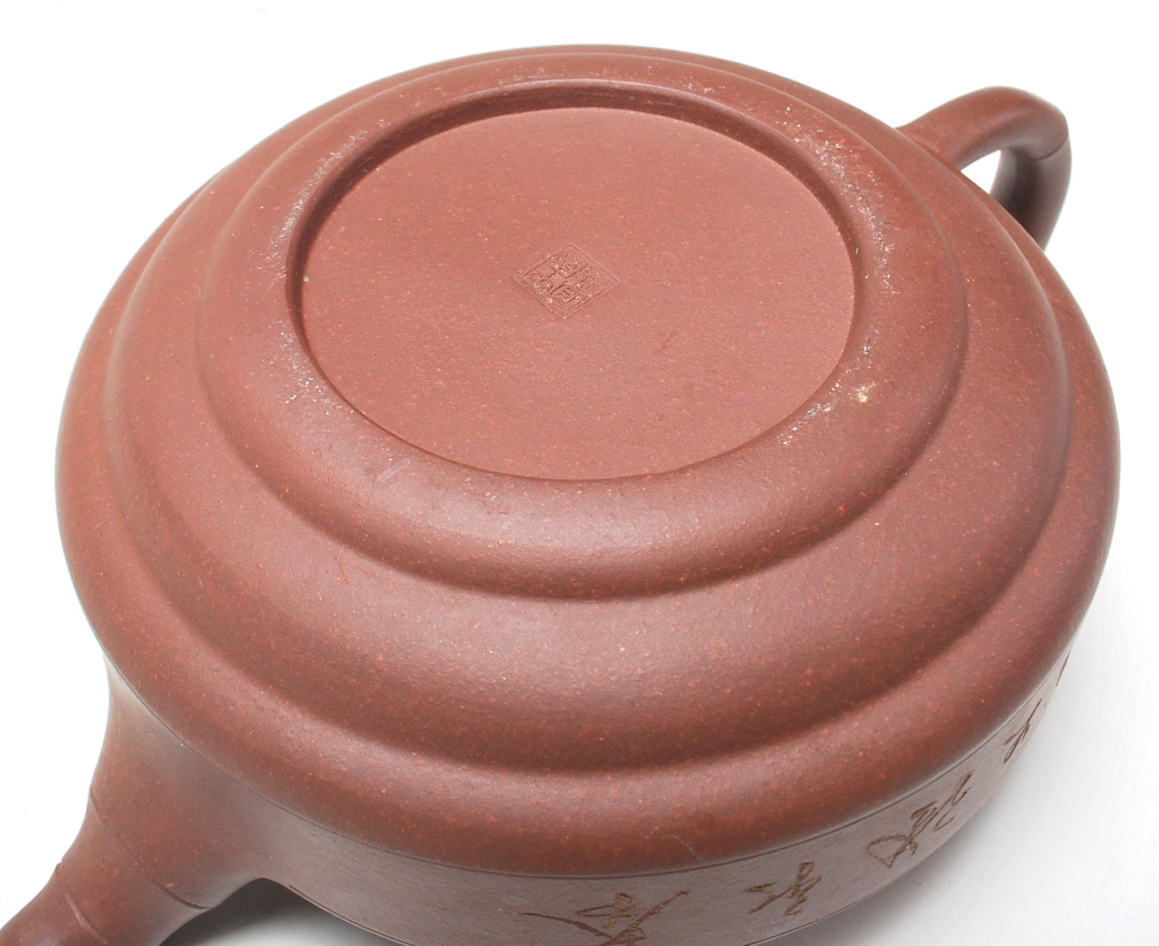 A 20th Century Chinese red clay Yi Xing teapot of round stepped form having a bamboo formed spout - Image 6 of 7