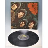 A vinyl long play LP record album by The Beatles – Rubber Soul – Original Parlophone 2nd U.K.