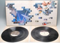 A vinyl long play LP record album by Pink Floyd – The Wall – Later US Press –  PC36183 Stereo. Vinyl