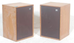 A pair of vintage 1960’s teak wood case wharfedale speakers, having brown fabric protection and wire