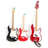 A collection of 3 vintage electric guitars to include an Encore black Stratocaster style guitar