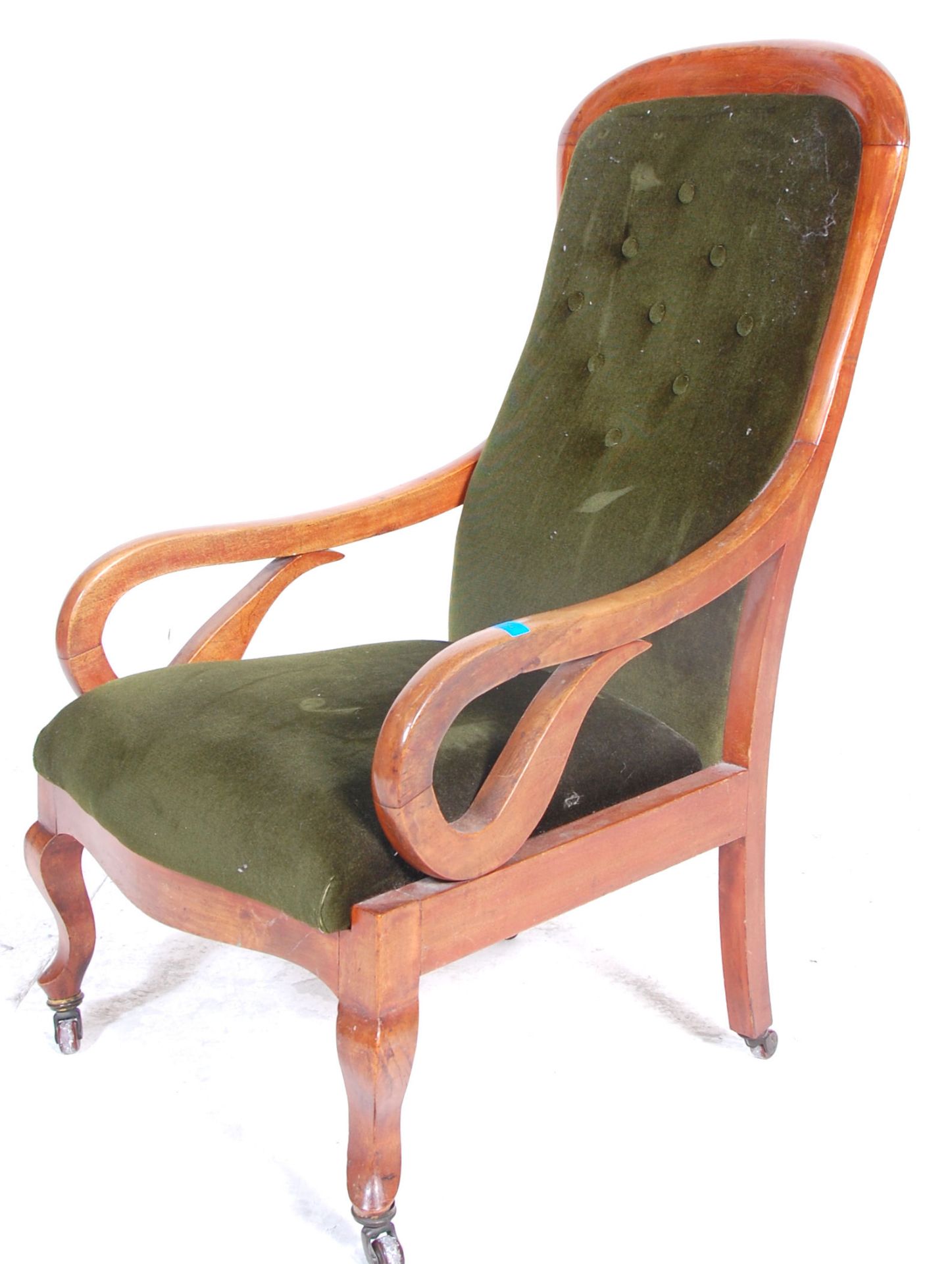 A Victorian 19th Century button back arm chair / library chair upholstered in green velour button - Bild 3 aus 3