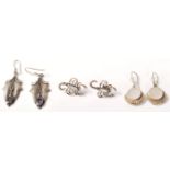 Three pairs of vintage ladies silver earrings to include a pair of Art Nouveau style ivy leaf drop