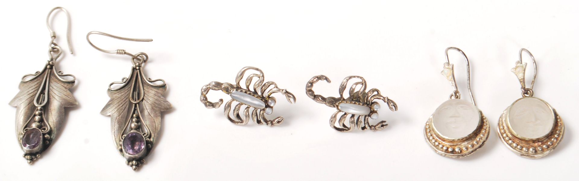 Three pairs of vintage ladies silver earrings to include a pair of Art Nouveau style ivy leaf drop