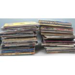 A good large collection of vinyl long play LP record albums and 12" singles of varying artists and