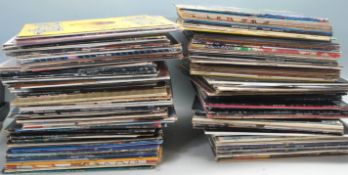 A good large collection of vinyl long play LP record albums and 12" singles of varying artists and