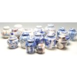 A collection of fifteen 20th Century Chinese blue and white printed ginger jars to include a good