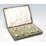 A set of six early 20th Century Edwardian Lawson & Co Scottish silver hallmarked teaspoons and sugar