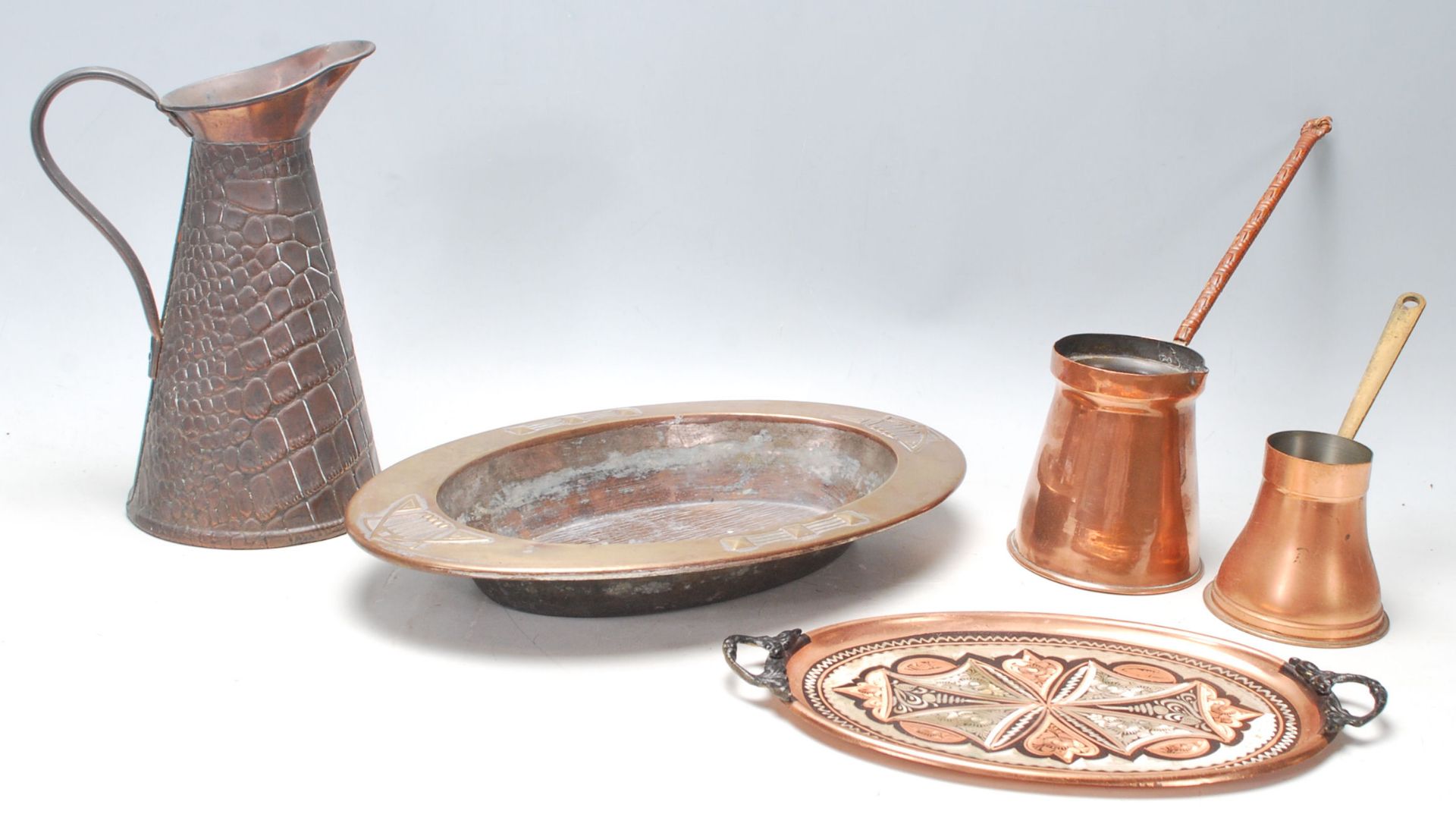 A collection of early 20th Century Art Nouveau copper and brass items to include a Joseph Sankey &