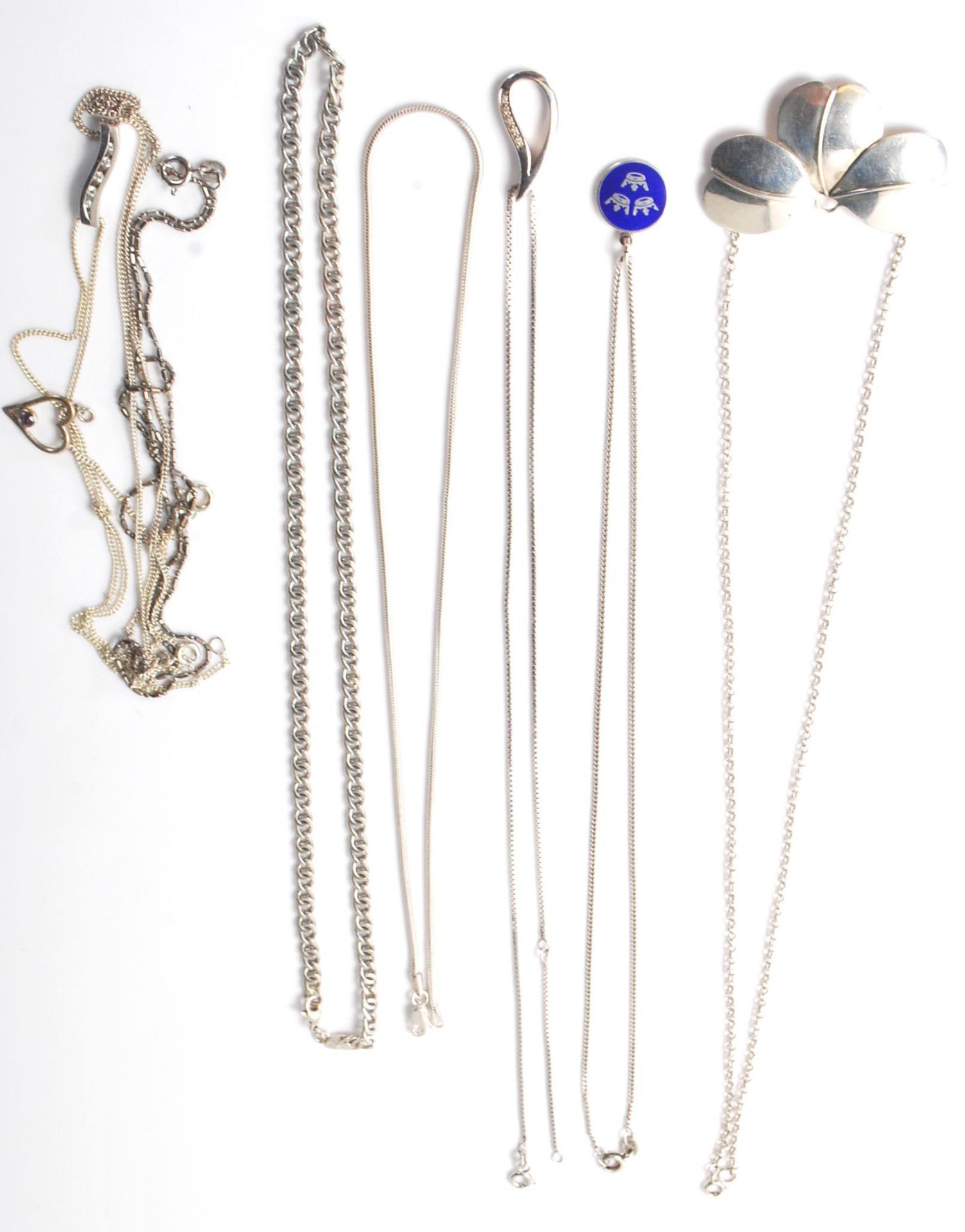 A collection of stamped 925 silver pendant necklaces to include a blue enamelled pendant with