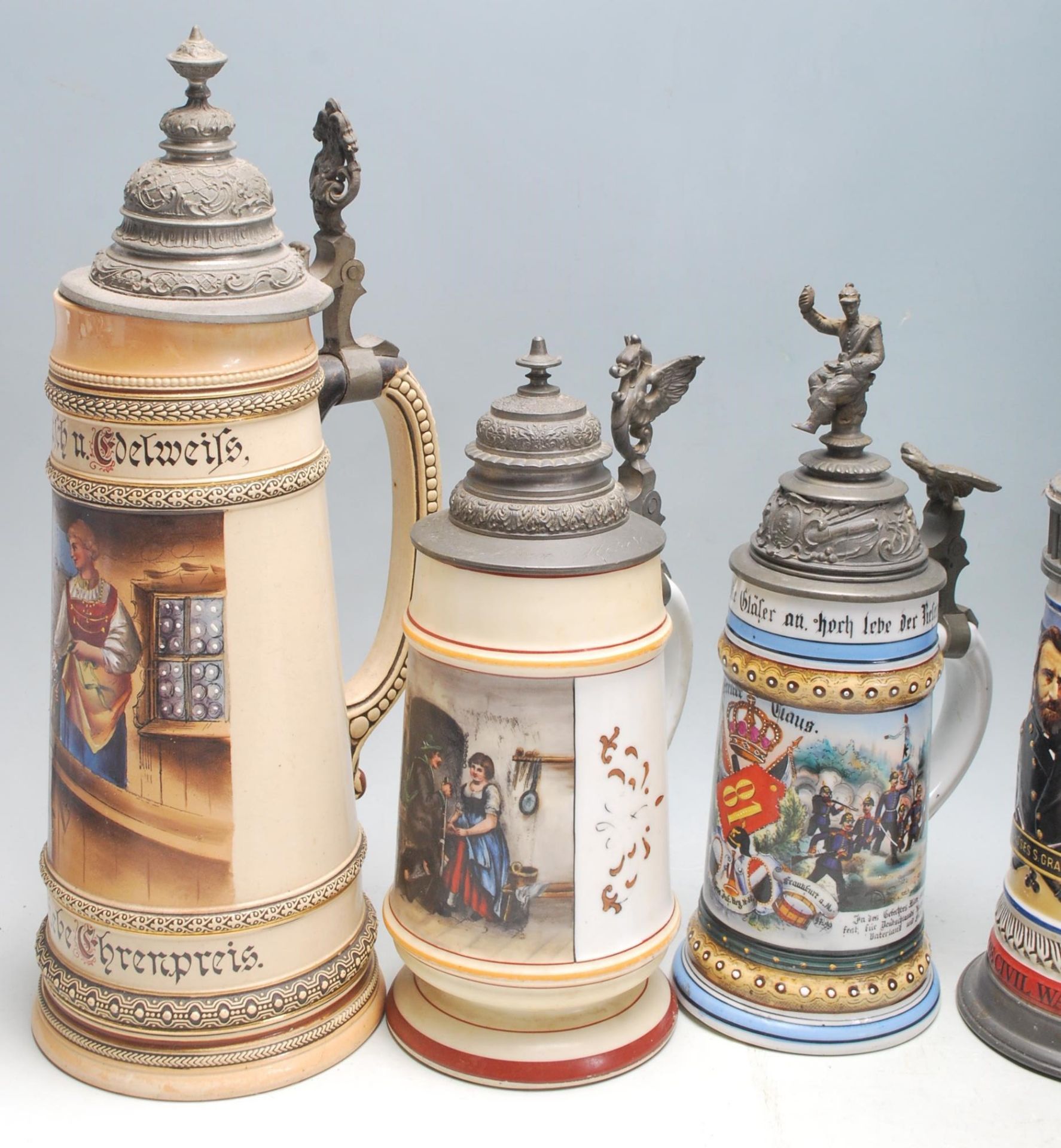 A collection of 20th Century German ceramic stein drinking glasses, each having raised polychrome - Bild 5 aus 7