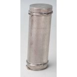 A silver hallmarked engine turned case in a cylindrical form with double ends hinged lids. London