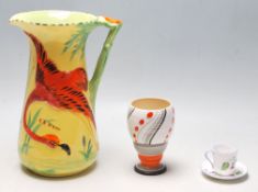 An Art Deco Burleigh Ware large water jug with a raised hand painted flamingo to the side and with a