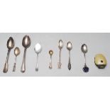 A good mixed group of silver spoons dating from the early 20th Century to include a golfing