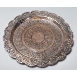 A 20th century antique silver Islamic tray having bamboo and plants life decorations to the inside