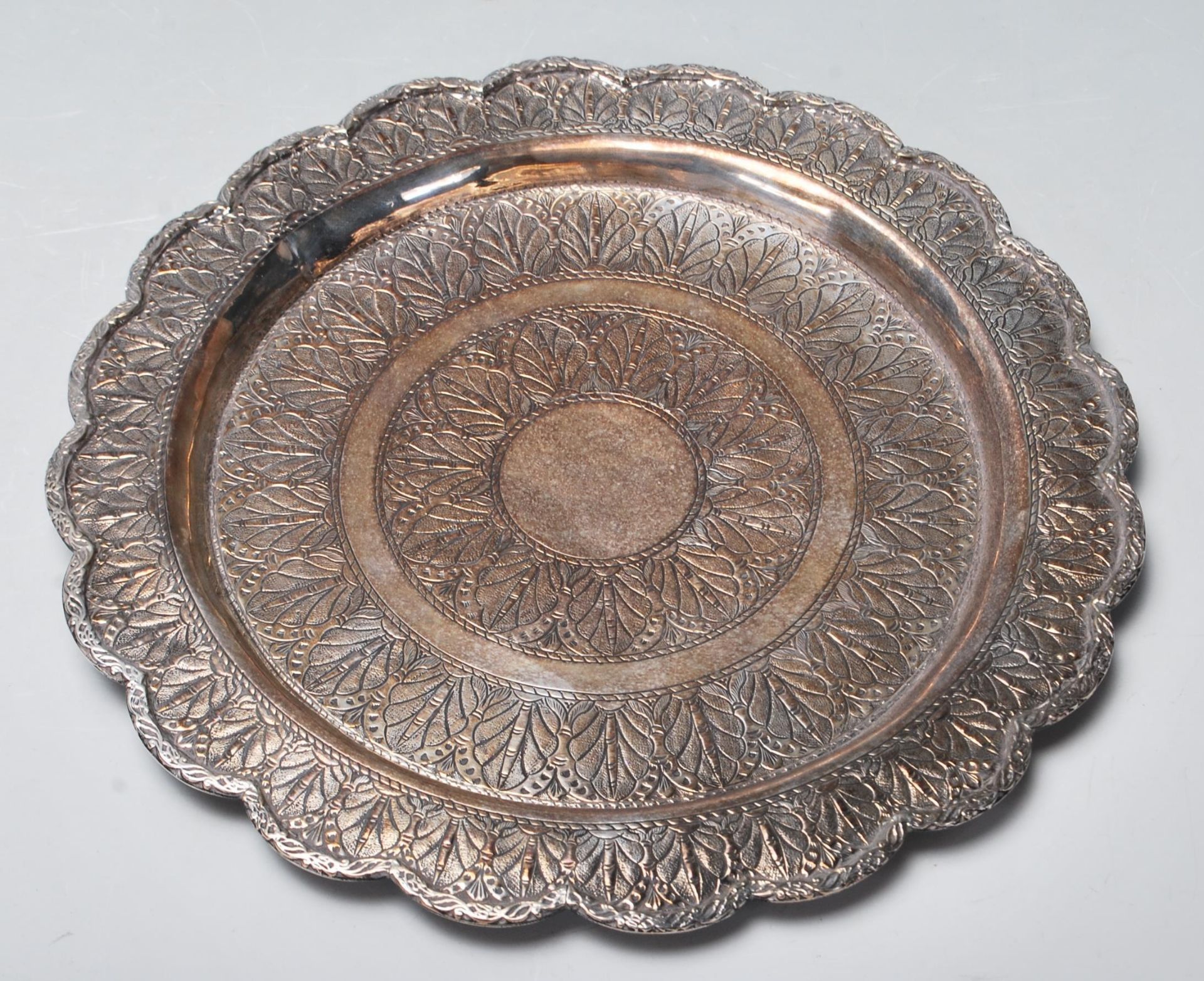 A 20th century antique silver Islamic tray having bamboo and plants life decorations to the inside