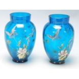 A pair of 19th Century Victorian Aesthetic Movement hand painted blue glass vases having a ribbed