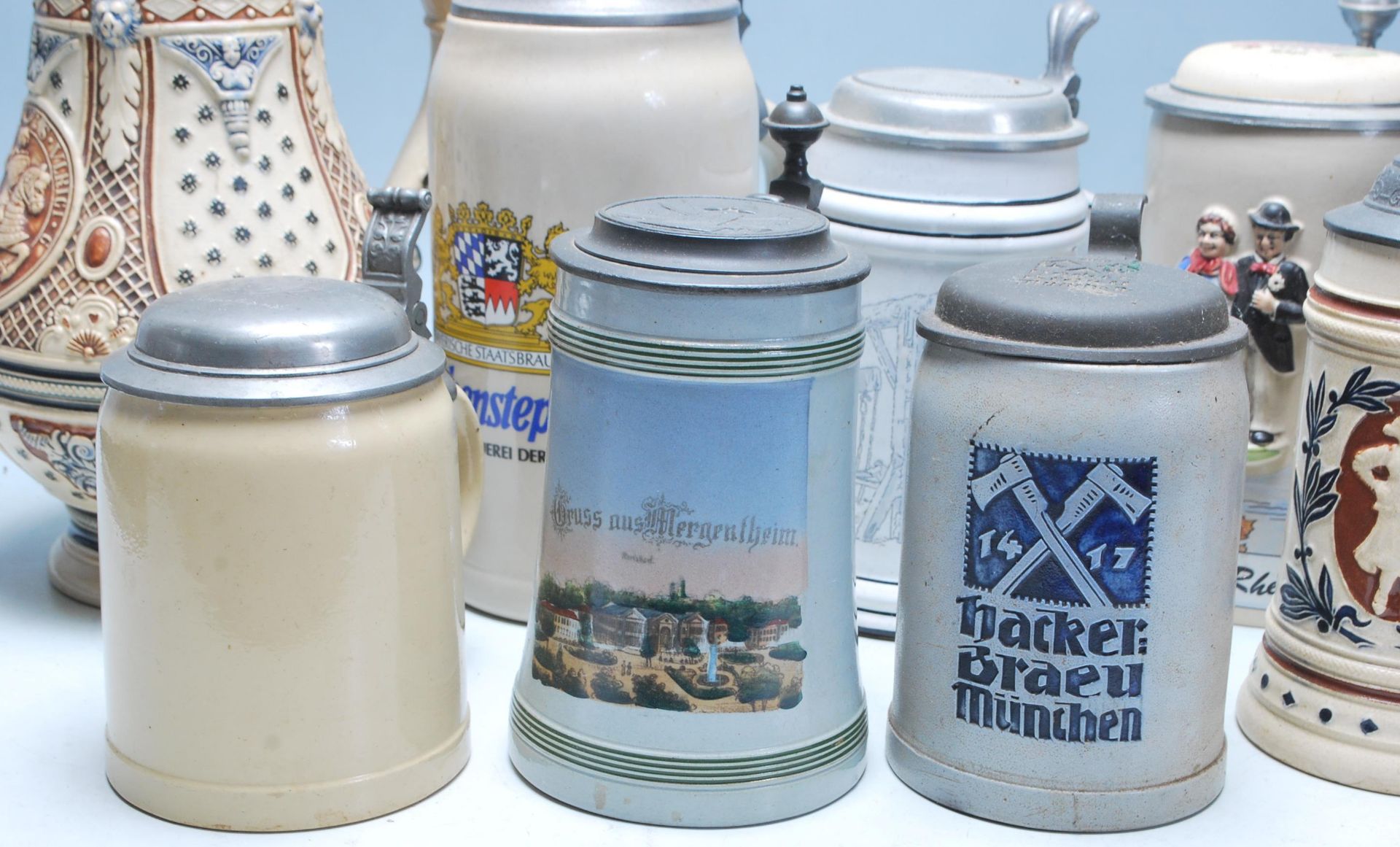 A large collection of German blue and grey stoneware jugs and beer steins, some having pewter - Bild 8 aus 14