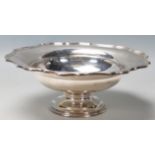 A 1920’s silver hallmarks day tazza dish / bowl having pie crust edges, raised in a circular