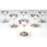 A set of 6 hallmarked Sterling Silver Champagne / Martini glasses / goblets, the bowls raised on a