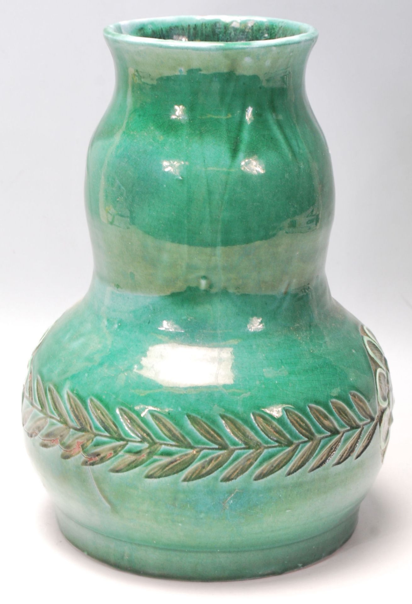 An early 20th Century Devonia Art Fremington Barum terracotta vase by Ed Judler in a bulbous form - Image 2 of 6