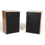 A pair of retro vintage 1980s teak speakers by Hacker. Model number LS550. Serial no 1180.