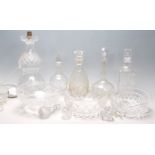 A collection of 20th Century cut glass items to include two large cut glass centrepiece bowls,