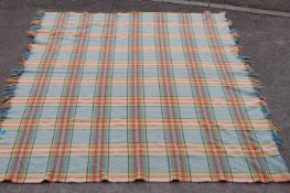 A large vintage 20th Century traditional Welsh woollen / wool blanket having a blue ground with red,