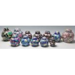 A collection of twelve 20th Century Chinese ginger jars all having hand enamelled floral sprays
