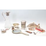 A collection of 20th Century silver plated and related items to include an unusual menu holder in