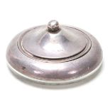 A silver hallmarked powder compact lidded pot having glass and silver body with silver lid