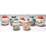 A collection of seven 20th Century Chinese porcelain ginger jars to include two famille verte floral