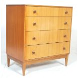 A vintage mid Century Danish manner teak wood chest of drawers. The chest having a bank of 4