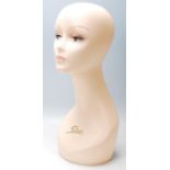 A vintage retro 20th century shop haberdashery point of sale / counter top female mannequin dummy
