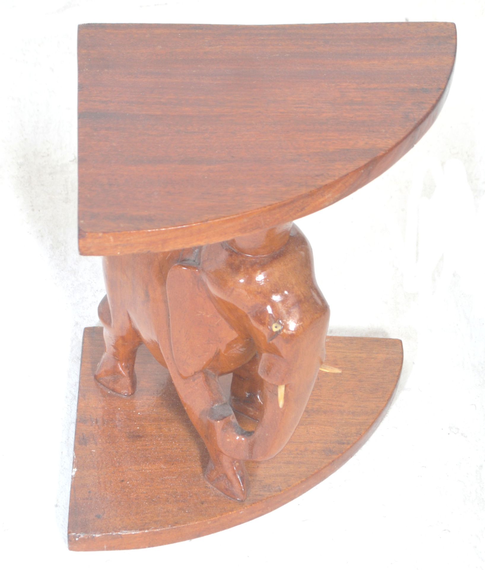 A vintage 20th Century African tribal carved wooden nest of tables having a carved top depicting a - Bild 6 aus 7