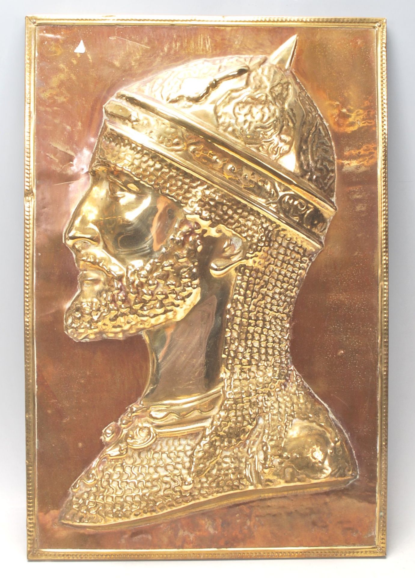 An vintage early 20th Century Islamic brass picture of a Syrian / Ottoman soldier in profile set