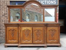 A substantial and impressive antique 1950s French / Belgian oak triple mirror backed breakfront