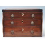 A 19th Century George III mahogany and inlaid desktop / apprentice piece chest of drawers with a
