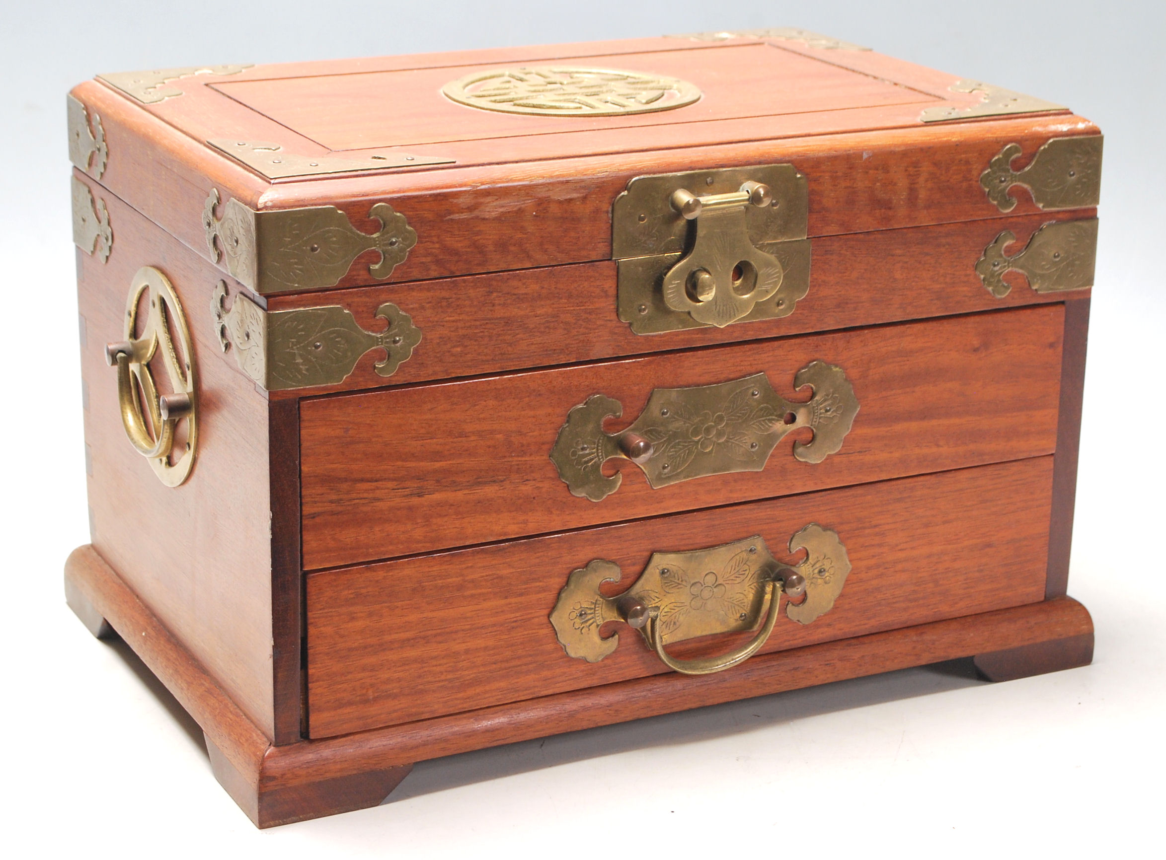 A vintage 20th Century Chinese wooden jewellery compartment box having a hinge lid to the top with