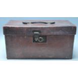 An Antique 20th Century Leather trunk / doctors / Gladstone bag of square form with a makers mark