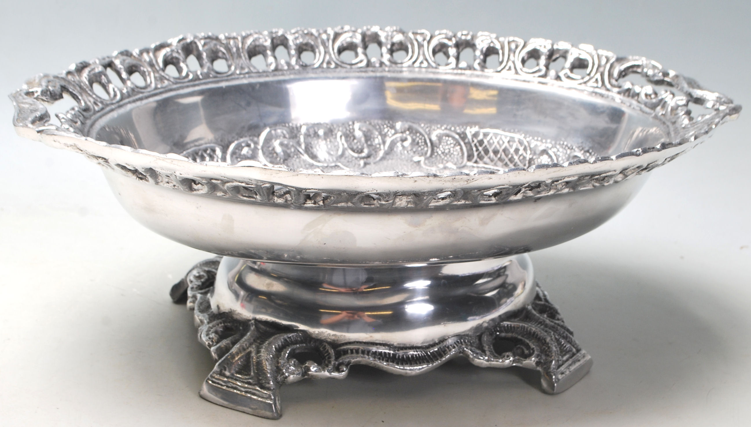 A 20th century Edwardian large silver plated fruit bowl / central piece of oval form with reposed