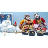 A group of four vintage puppet dolls to include a pair of Thai / oriental dolls having wooden