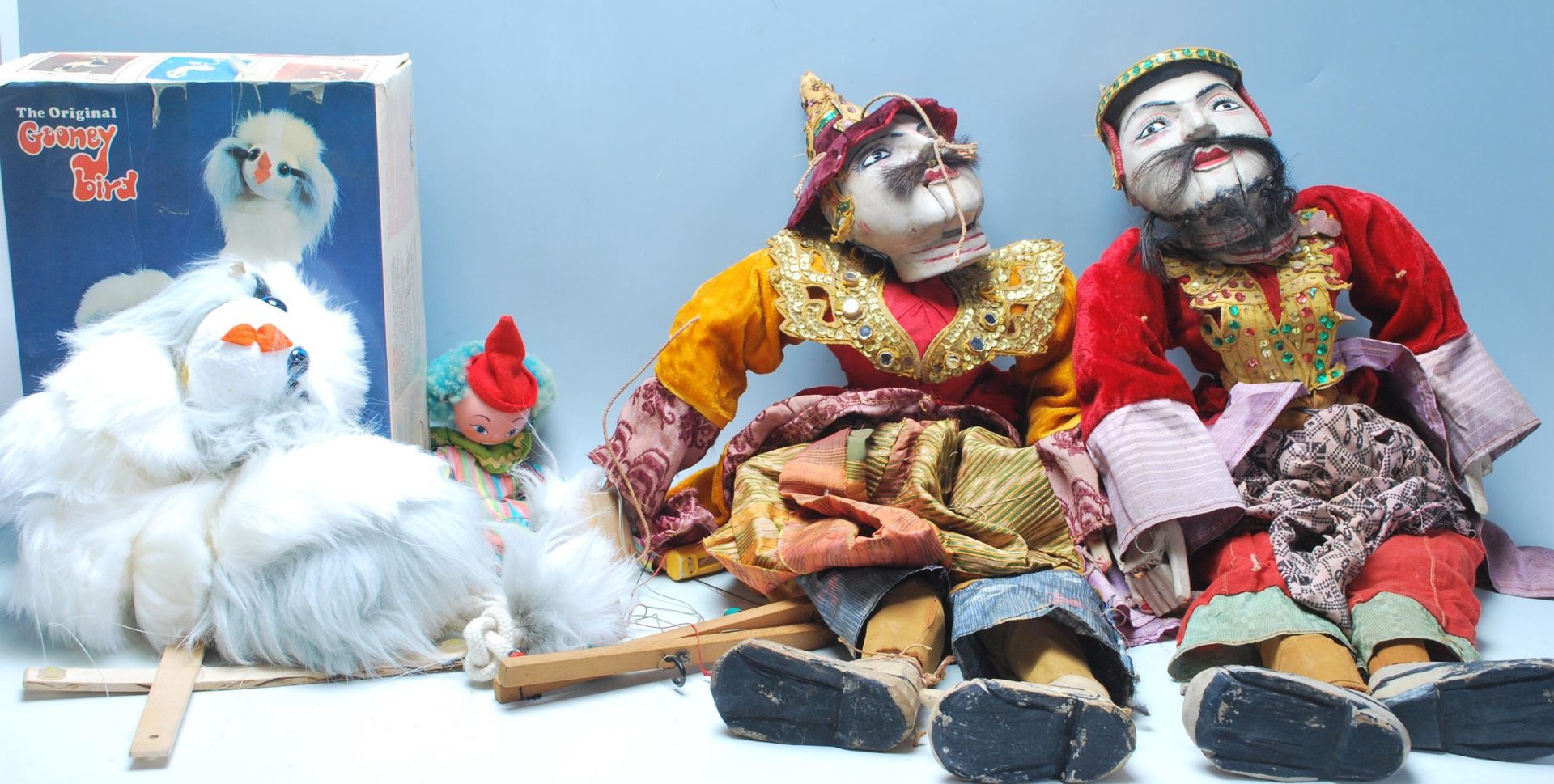 A group of four vintage puppet dolls to include a pair of Thai / oriental dolls having wooden