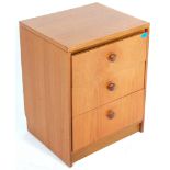 A retro vintage mid 20th Century teak pedestal chest of drawers. The upright body with round drawers