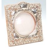 A silver 1901 Birmingham hallmarked photograph frame by Synyer and Beddoes (Harry Synyer & Charles