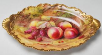 A Royal Worcester twin handled dish dated 1928 by T Lockyer, hand painted / decorated with fruit