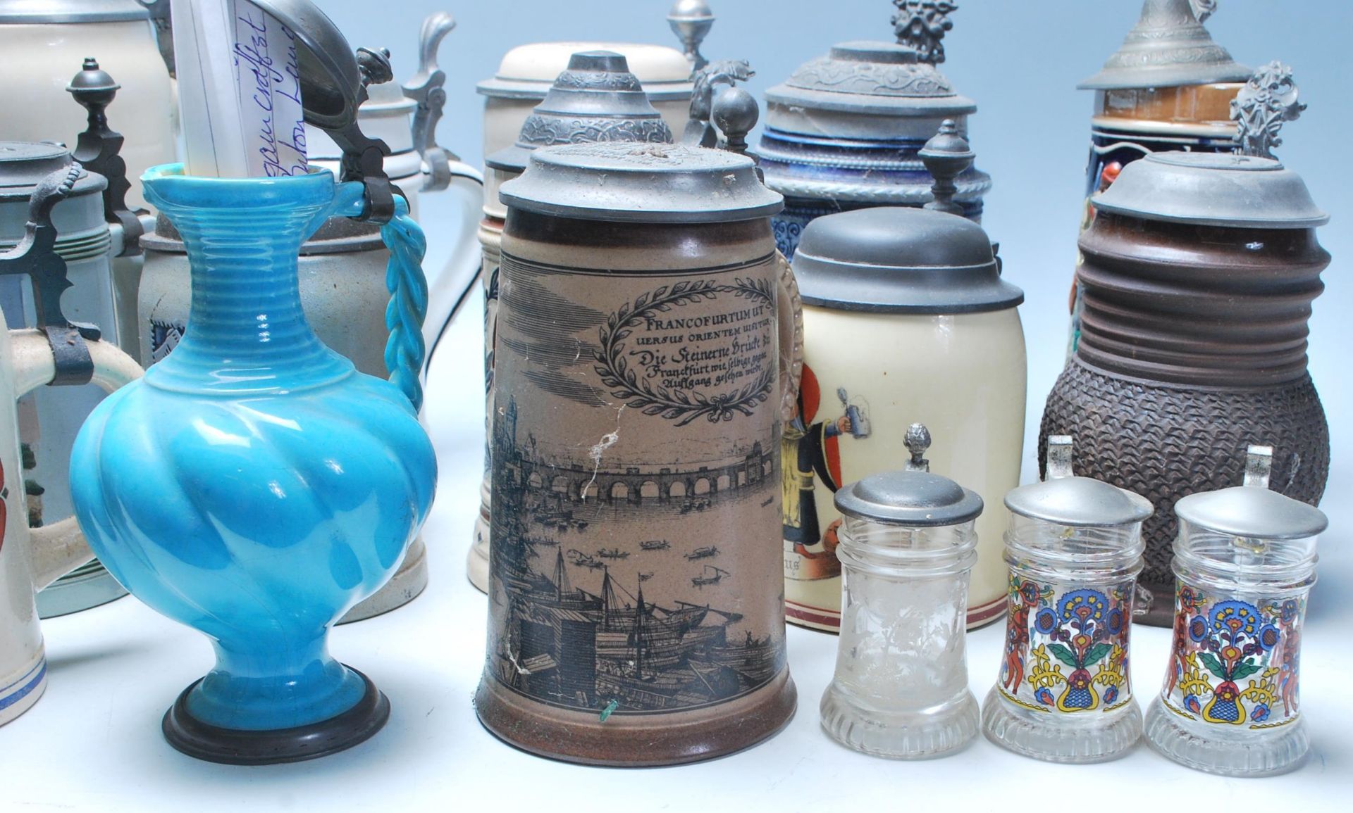 A large collection of German blue and grey stoneware jugs and beer steins, some having pewter - Bild 5 aus 14
