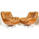 A pair of vintage, mid century retro Danish inspired egg chairs  - easy swivel armchairs. Each being