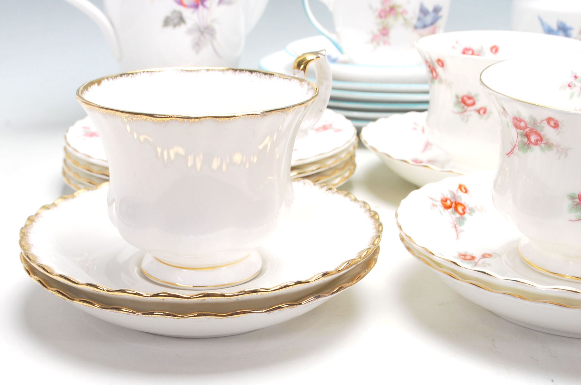 A selection of Royal Albert English bone china tea sets to include Rose Time pattern tea cups, - Image 2 of 11